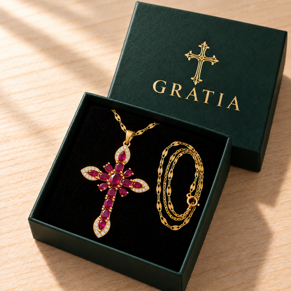 Ruby Gratia cross necklace in its Gratia gift box
